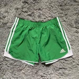 Green adidas shorts